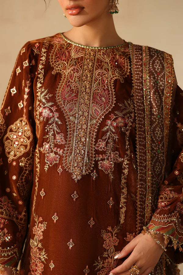 Embroidered velvet shirt with intricate gold and pink embroidery