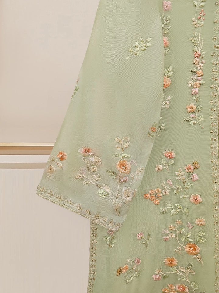 Close-up of floral embroidery on Agha Noor suit sleeve