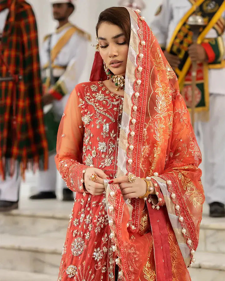 AROOSH Wedding Wear AR-103-2200 with red and gold embroidery and organza dupatta, styled for a traditional Pakistani wedding. Features elegant naqshi and dabka work.