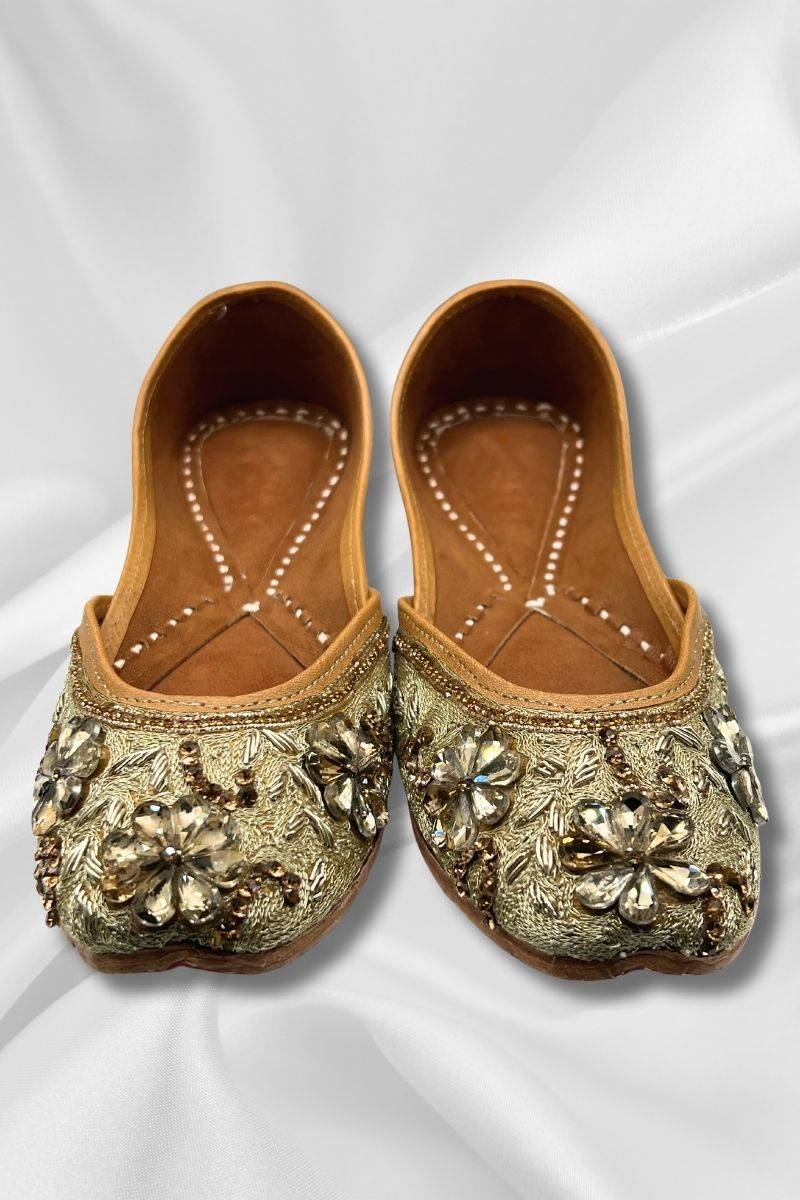 Front view of Sajawat Golden Khussa featuring detailed gold threadwork and embellishments, perfect for ethnic party outfits.