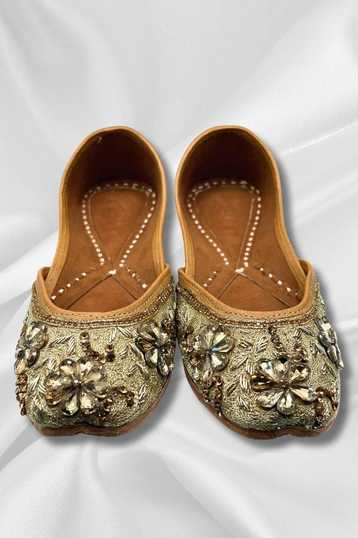 Front view of Sajawat Golden Khussa featuring detailed gold threadwork and embellishments, perfect for ethnic party outfits.