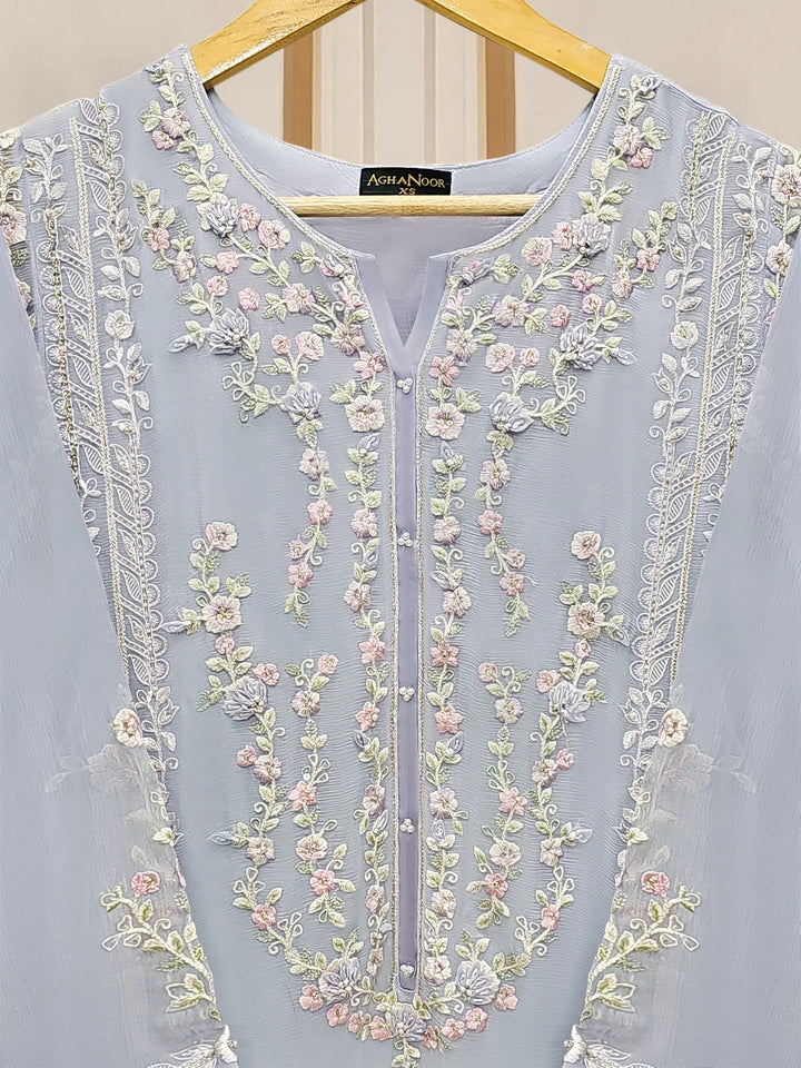 Detailed embroidery on front of chiffon suit