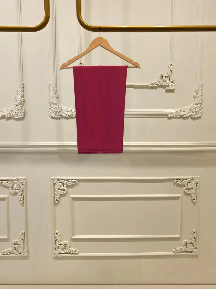 Plain deep pink Korean silk pants from AGHA NOOR 3 Piece Embroidered Set, complementing the embroidered shirt and dupatta.