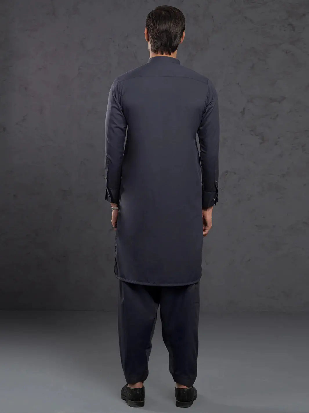 Back view of man in navy blue kurta with straight cut, long sleeves, and traditional design for men&