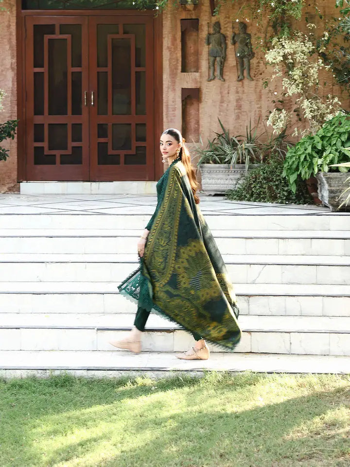 Side profile of model walking in rangreza AL-1130 green chikankari suit with flowing printed shawl, perfect for Pakistani formal wear.