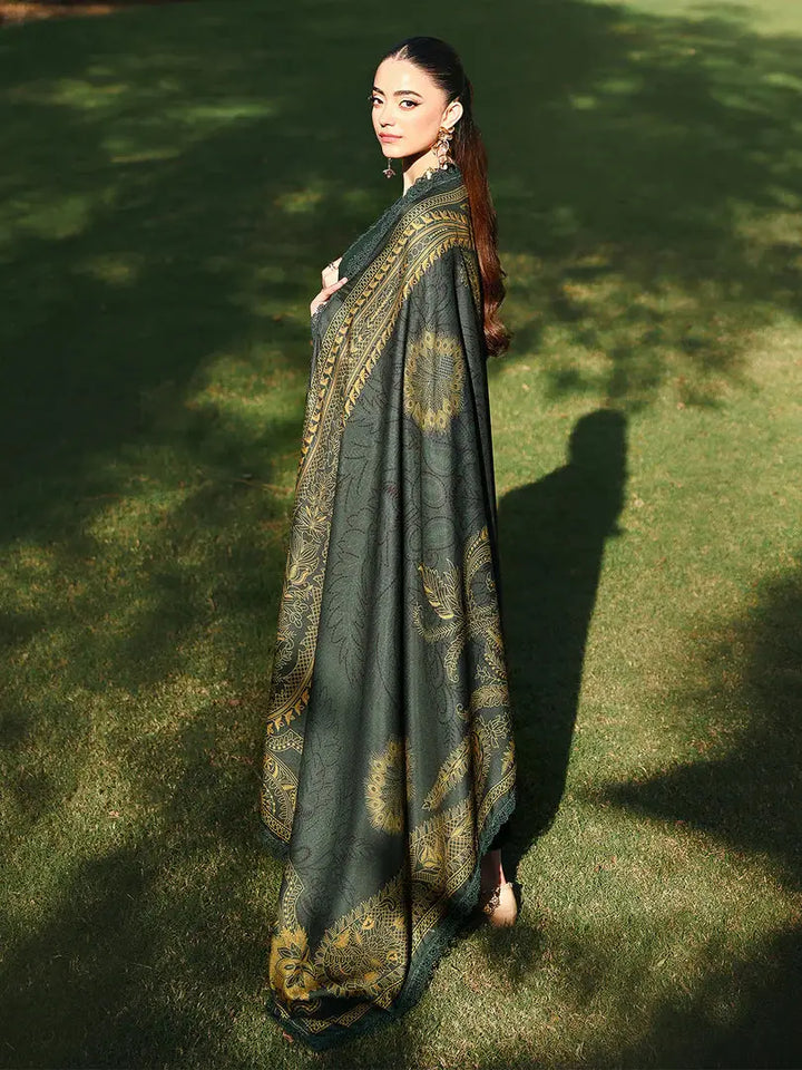 rangreza AL-1130 wool shawl with golden paisley print displayed outdoors, paired with deep green traditional chikankari attire.