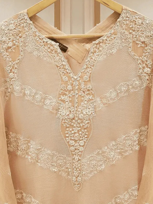 Close-up of Agha Noor shirt embroidery details