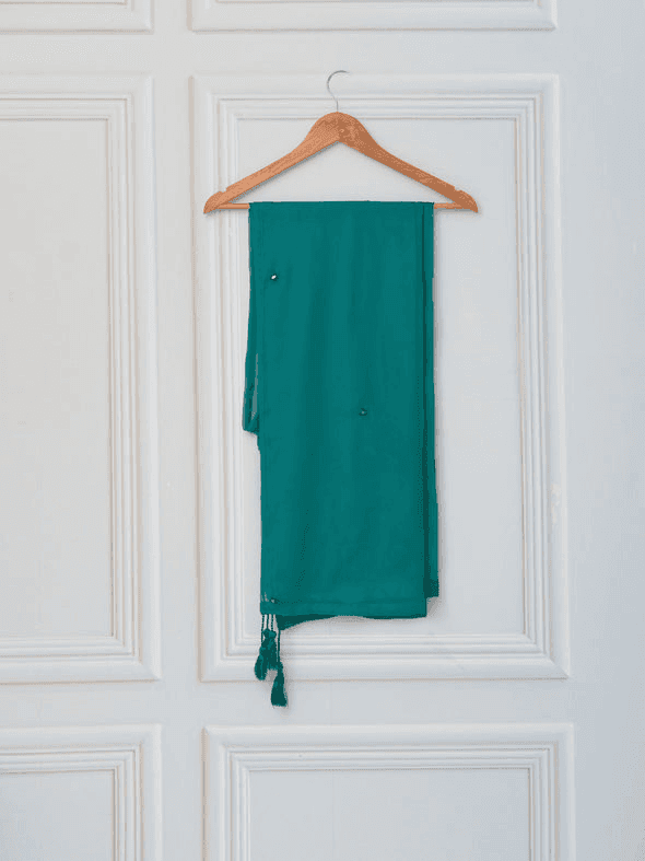 Green chiffon dupatta on hanger with tassels