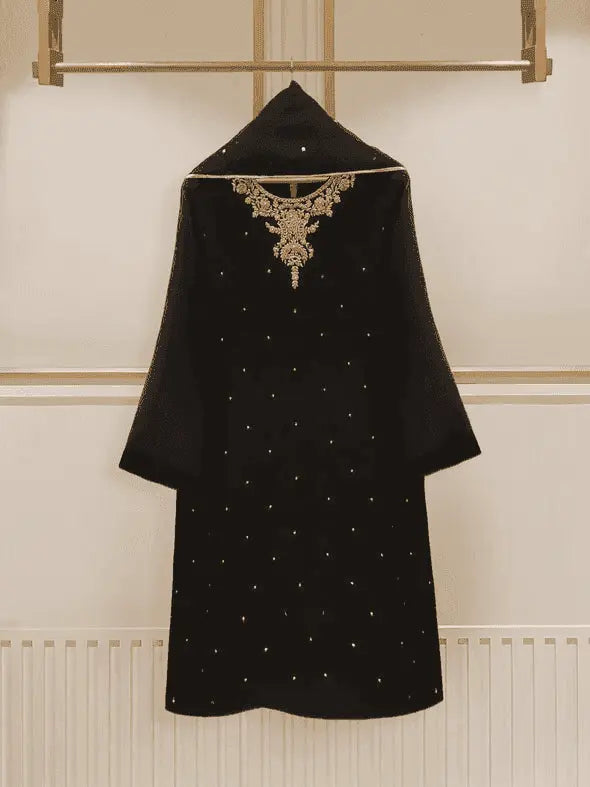 Agha Noor black chiffon dress with gold embroidery back view