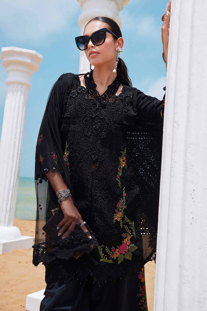 Close-up of black embroidered lawn suit AL-4296 featuring intricate lacework and floral embroidery, paired with sheer dupatta for a formal Pakistani outfit.