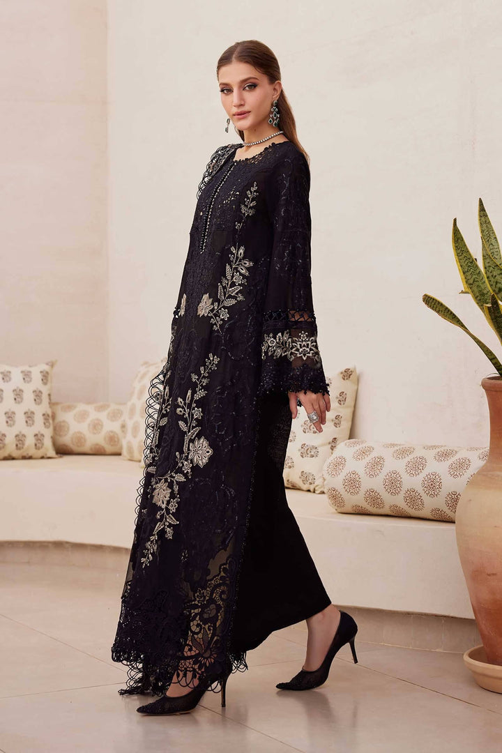 Side view of AL-4312 embroidered women's 3 piece suit with floral motifs and organza detailing, paired with black heels.
