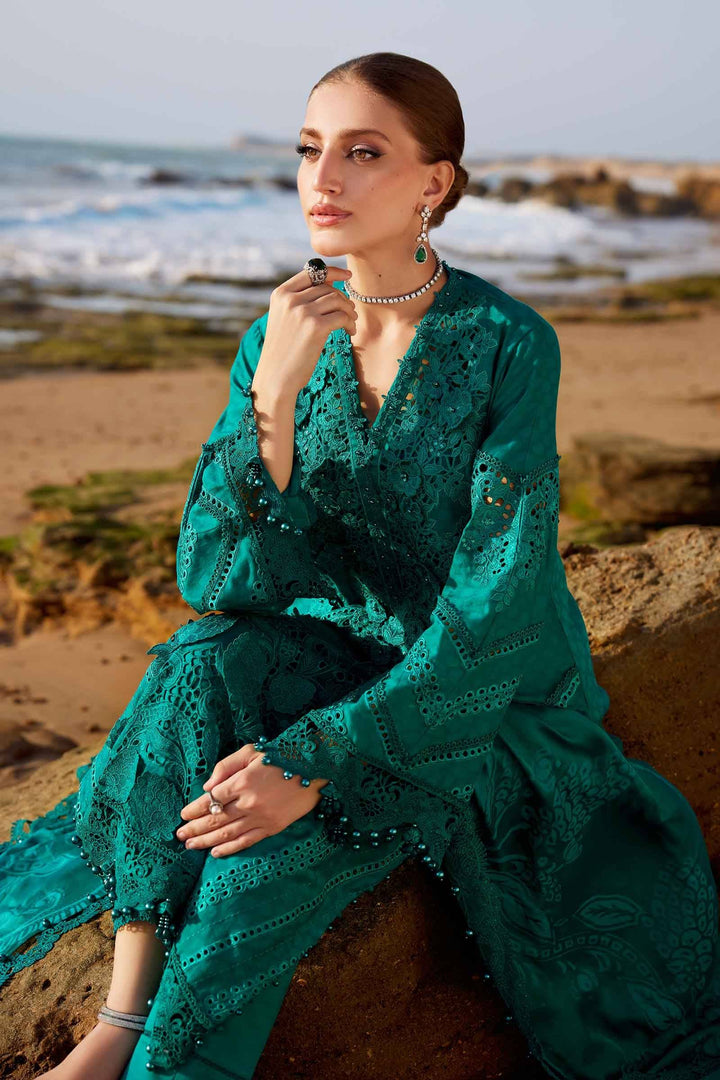 Close-up of AL-4310 sea green ladies suit showcasing fine embroidery and 3D floral accents on lawn fabric, perfect for elegant gatherings.