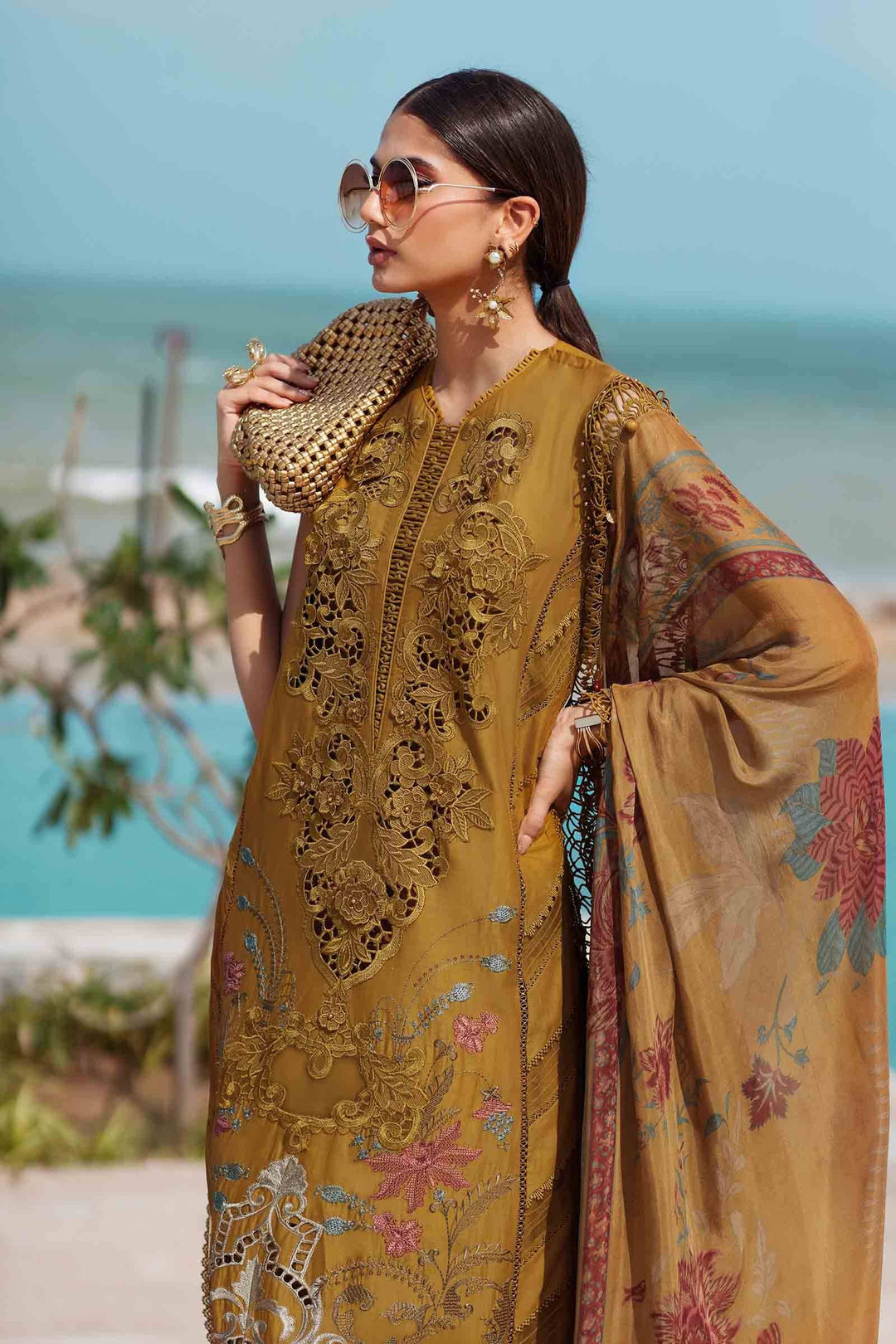 Close-up of Embroidered Lawn - women's 3 piece suit | Wedding & Festive Wear with detailed cutwork, floral embroidery, and printed organza dupatta.