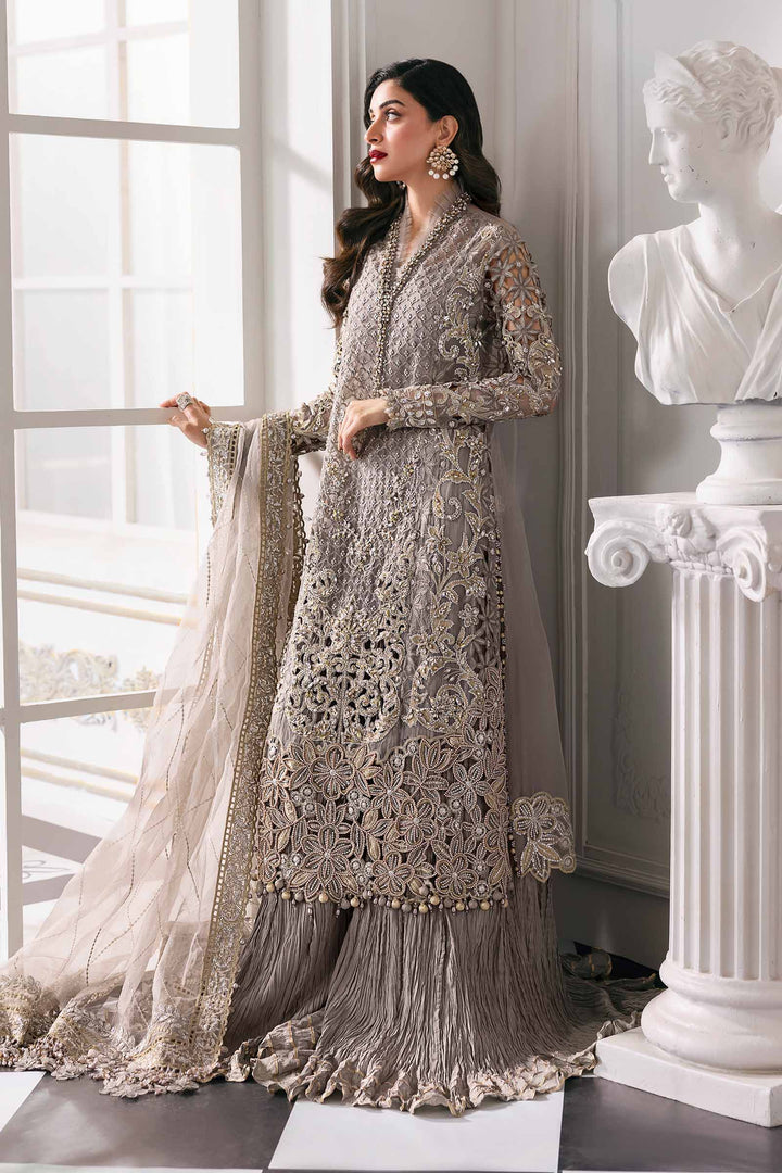 Elegant pose in Embroidered Organza Stitched 3-Piece Outfit Luxury | AL-4232 featuring gold threadwork and sheer dupatta for upscale fashion.
