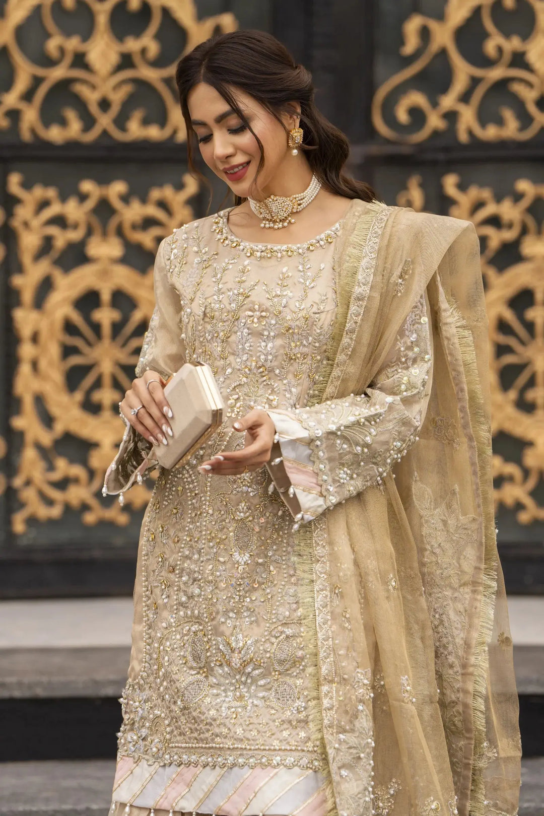 Close-up of AROOSH Kundan Masoori Embroidered Shirt with delicate handwork, paired with matching gharara and dupatta for a wedding look.