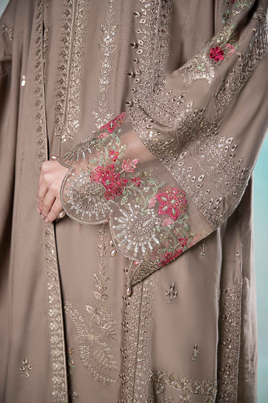 Close-up of embroidered sleeve on coffee linen suit with floral detailing and scalloped cuff, part of 3 Piece Embroidered Suit - Semi Formal Suit.