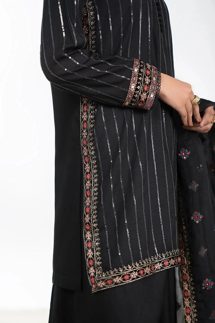 Embroidered black linen shirt with detailed borders