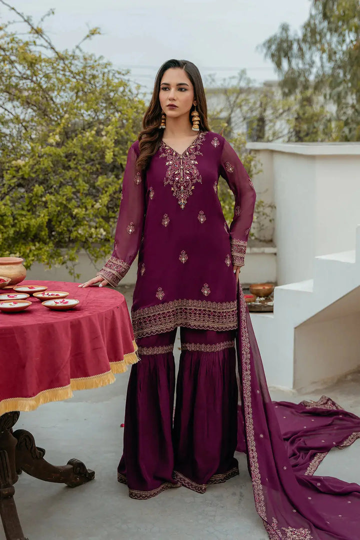 CHINYERE Embroidered Suit - Chiffon Dresses | 3 Piece Set in plum with mirror, tilla, and Resham work, styled with gharara and dupatta outdoors.