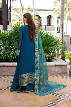 Back view of Maryum and Maria Dewi embroidered chiffon outfit with organza dupatta, showcasing elegant teal and gold border design.