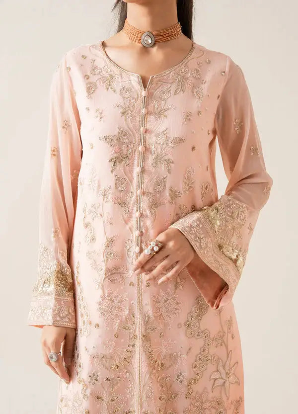 Close-up of MARYUM AND MARIA ELYNA shirt highlighting delicate gold embroidery on chiffon fabric and ornate sleeve detailing.