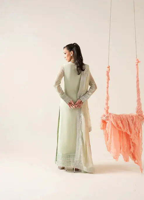 Back view of MARYUM AND MARIA 3 Piece Chiffon outfit highlighting the plain back design of the shirt and soft flow of the dupatta.