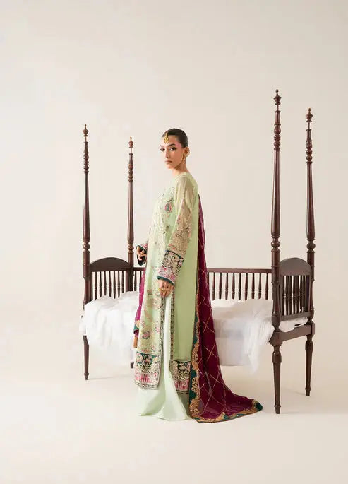 Side view of MARYUM AND MARIA Chiffon Suit - Formal Clothes Pakistan, showcasing embroidery and rich maroon dupatta design.