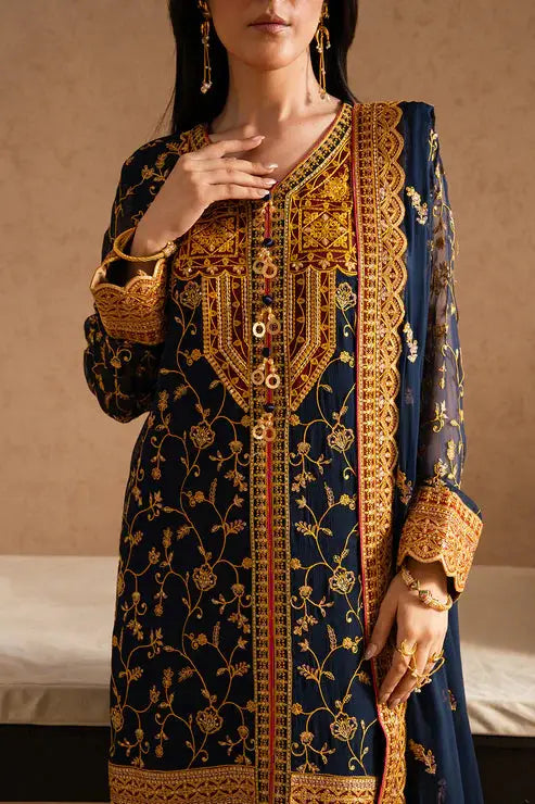 Close-up of detailed gold embroidery on navy chiffon shirt from MARYUM AND MARIA's Zehra 3 piece party wear collection.