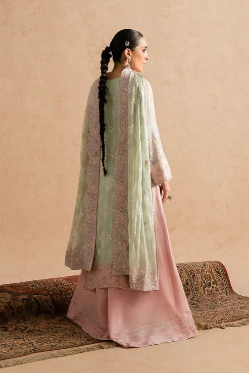 Back view of MARYUM AND MARIA embroidered chiffon dress set featuring pastel green shirt with pink dupatta and wide-leg pants, perfect for festive occasions.
