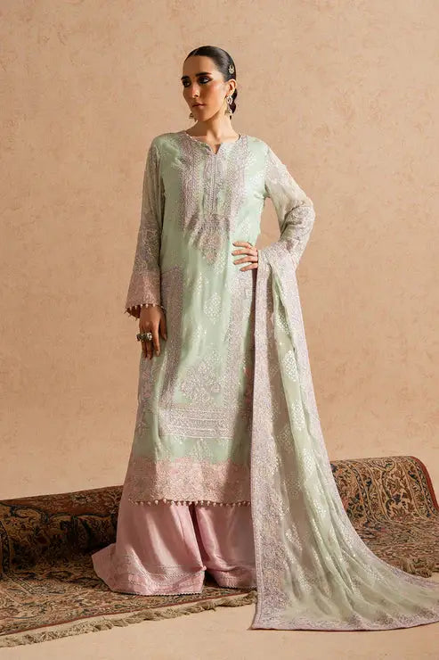 Front pose of MARYUM AND MARIA 3-piece chiffon dress with elegant embroidery on mint green shirt and blush pink pants, from top dress brands in Pakistan.