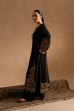 Side view of Maryum & Maria Chiffon ZEYNEB black embroidered shirt and pants set, showcasing intricate sleeve and hem detailing.