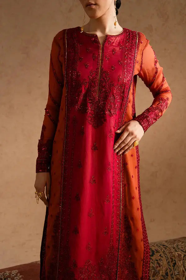 Close-up of MARYUM AND MARIA embroidered chiffon shirt showcasing intricate detailing and rich red-orange hues for formal occasions.