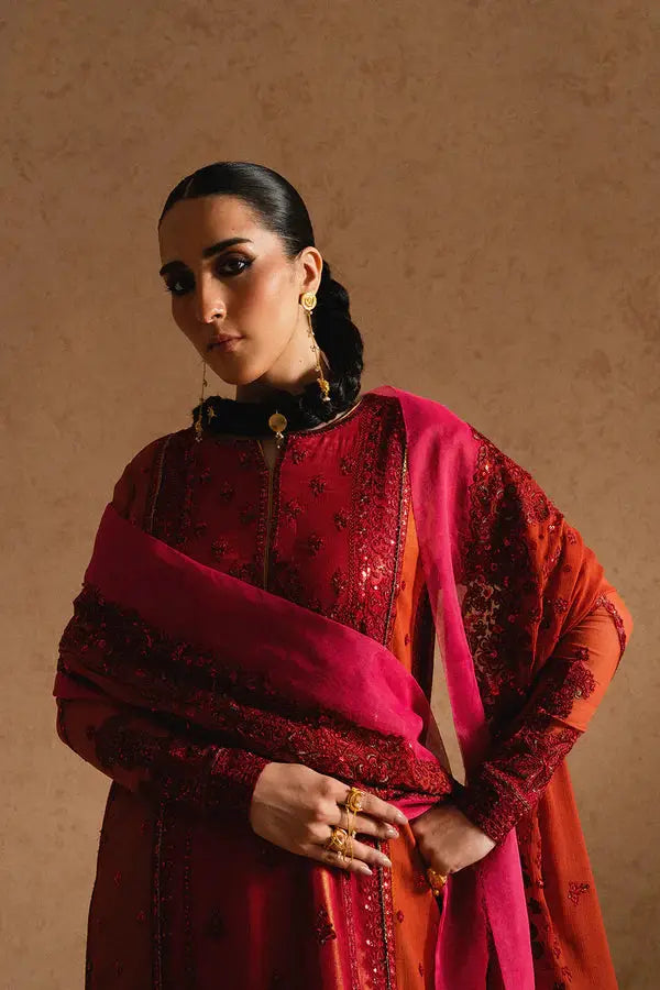 Model wearing MARYUM AND MARIA embroidered chiffon formal set with vibrant dupatta, perfect for Pakistani festive and wedding events.