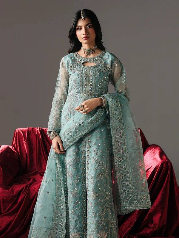Front view of frost blue embroidered dress with jewelry