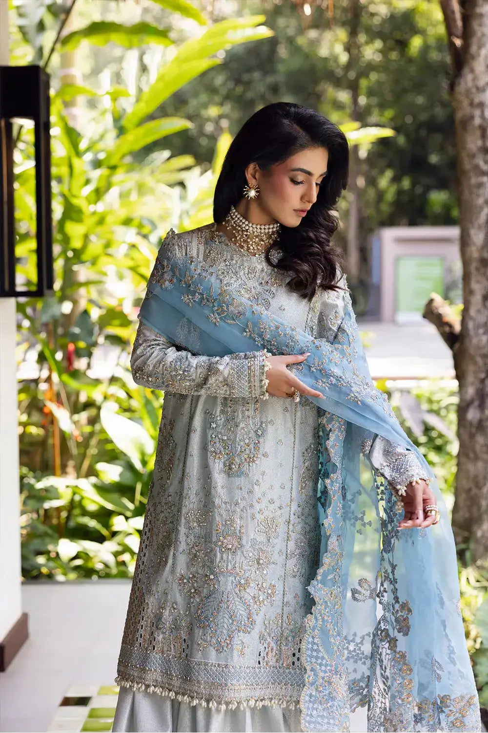 Close-up of Saira Rizwan's SORAYA-SRF25-06 with embroidered shirt and sheer blue dupatta, perfect for formal occasions.