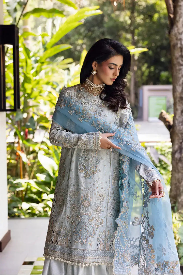 Close-up of Saira Rizwan's SORAYA-SRF25-06 with embroidered shirt and sheer blue dupatta, perfect for formal occasions.