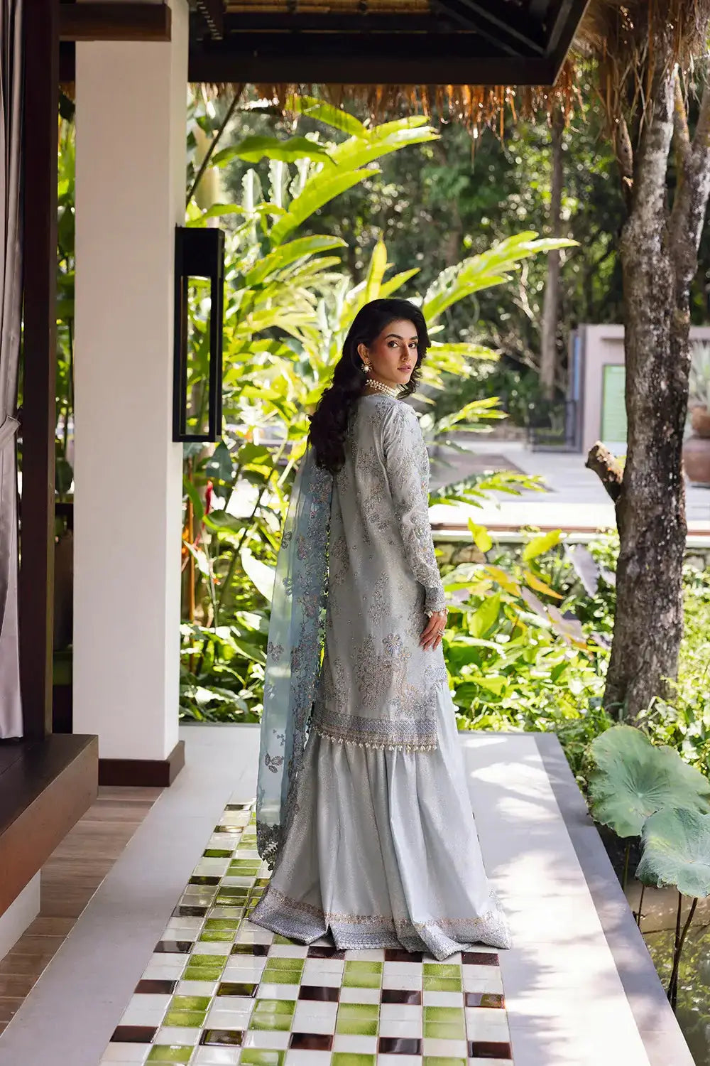 Back view of SORAYA-SRF25-06 by Saira Rizwan featuring detailed embroidery and flowing organza dupatta in luxury ice blue.