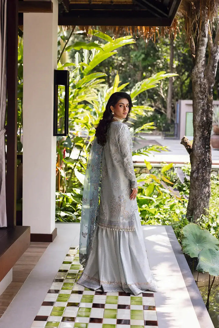 Back view of SORAYA-SRF25-06 by Saira Rizwan featuring detailed embroidery and flowing organza dupatta in luxury ice blue.
