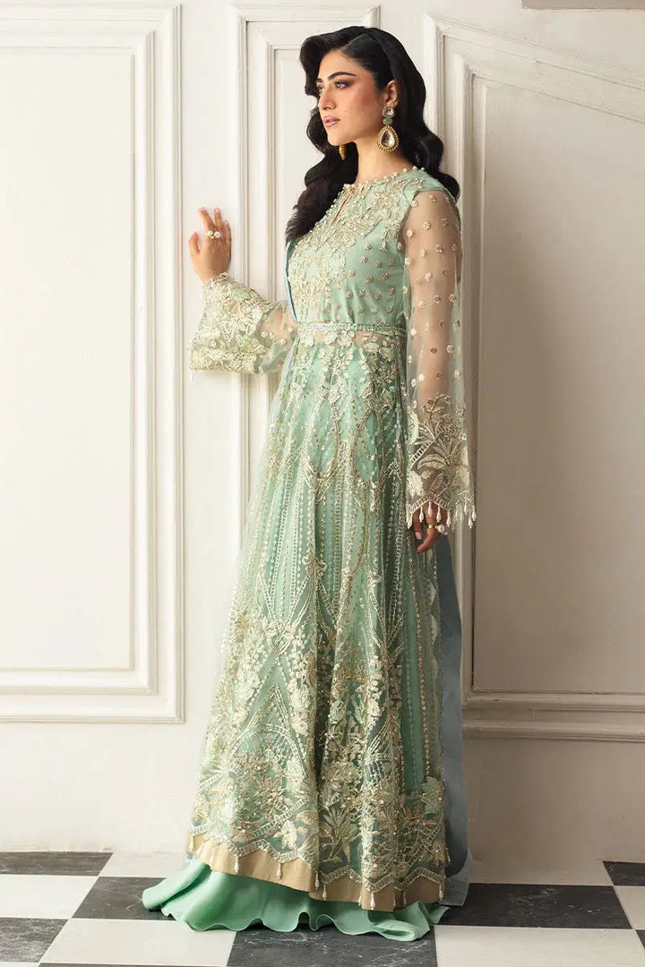 Side profile of MUSHQ Green Pistachio Dress with gold embroidery, net sleeves, and elegant dupatta in formal wear apparel category.