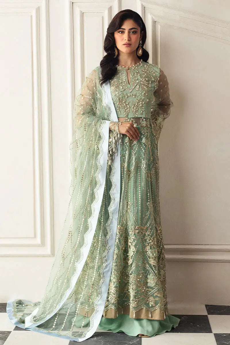 Front view of MUSHQ Green Pistachio Dress - Formal Wear with sequin embroidery, sheer sleeves, and net dupatta for luxury events.