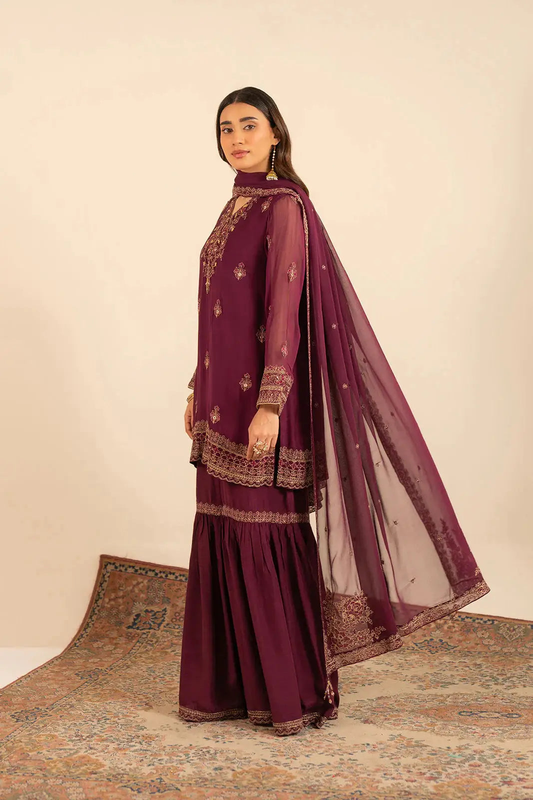 CHINYERE Embroidered Suit - Chiffon Dresses | 3 Piece Set in plum with gold embroidery, styled with gharara and sheer dupatta.