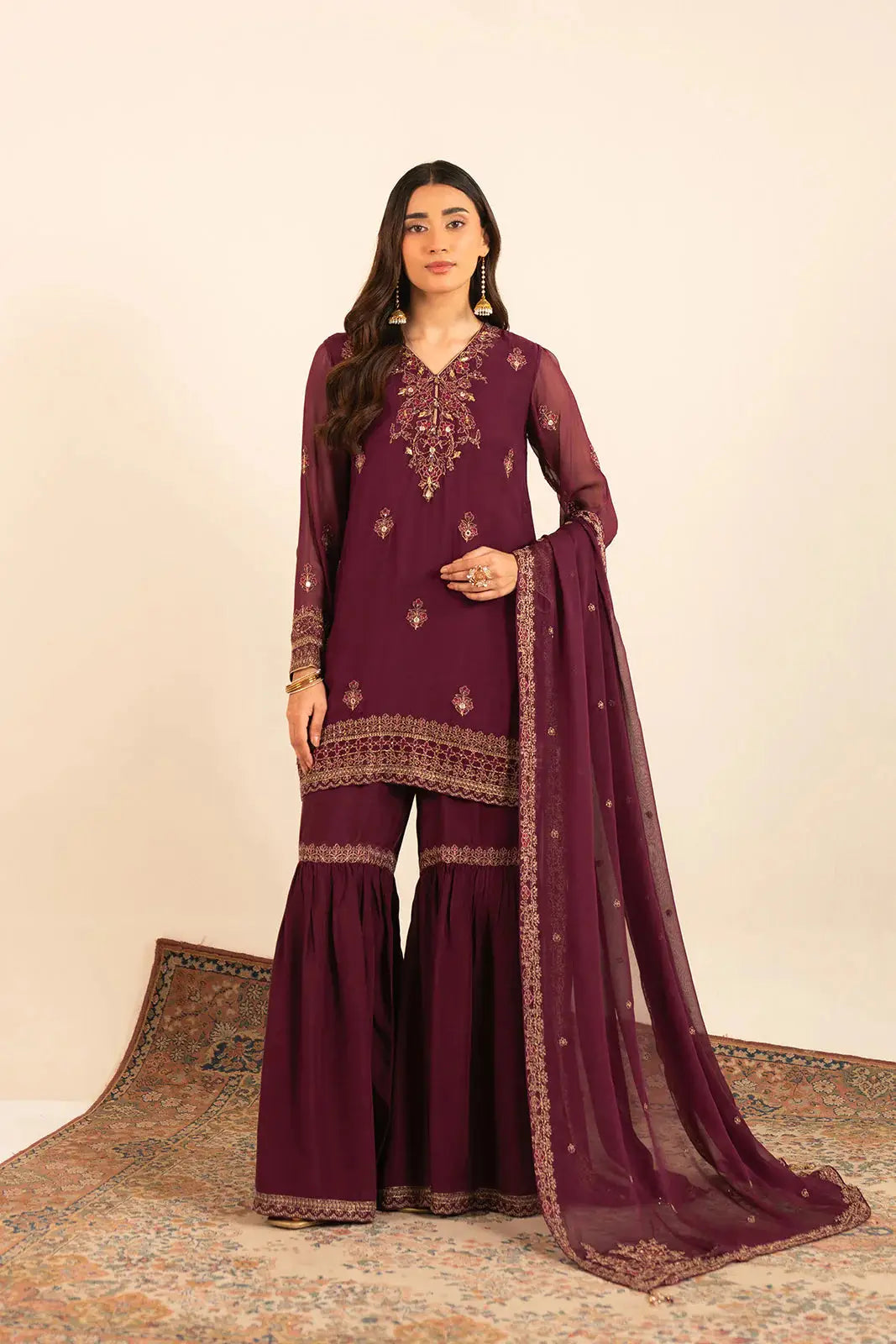 Front view of CHINYERE 3 Piece Chiffon Embroidered Suit with ornate neckline and matching dupatta, ideal for festive occasions.