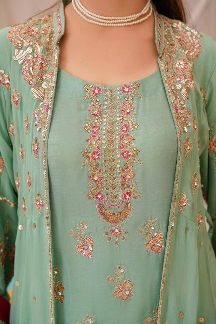 Close-up of intricate embroidery on traditional attire