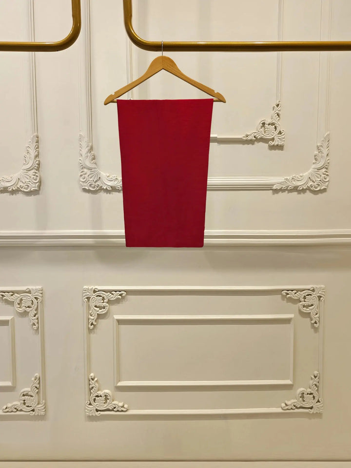 Plain red pants from AGHA NOOR Embroidered Suit - USA | Cotton Elegance, tailored for a sleek and comfortable fit with matching shirt and dupatta.
