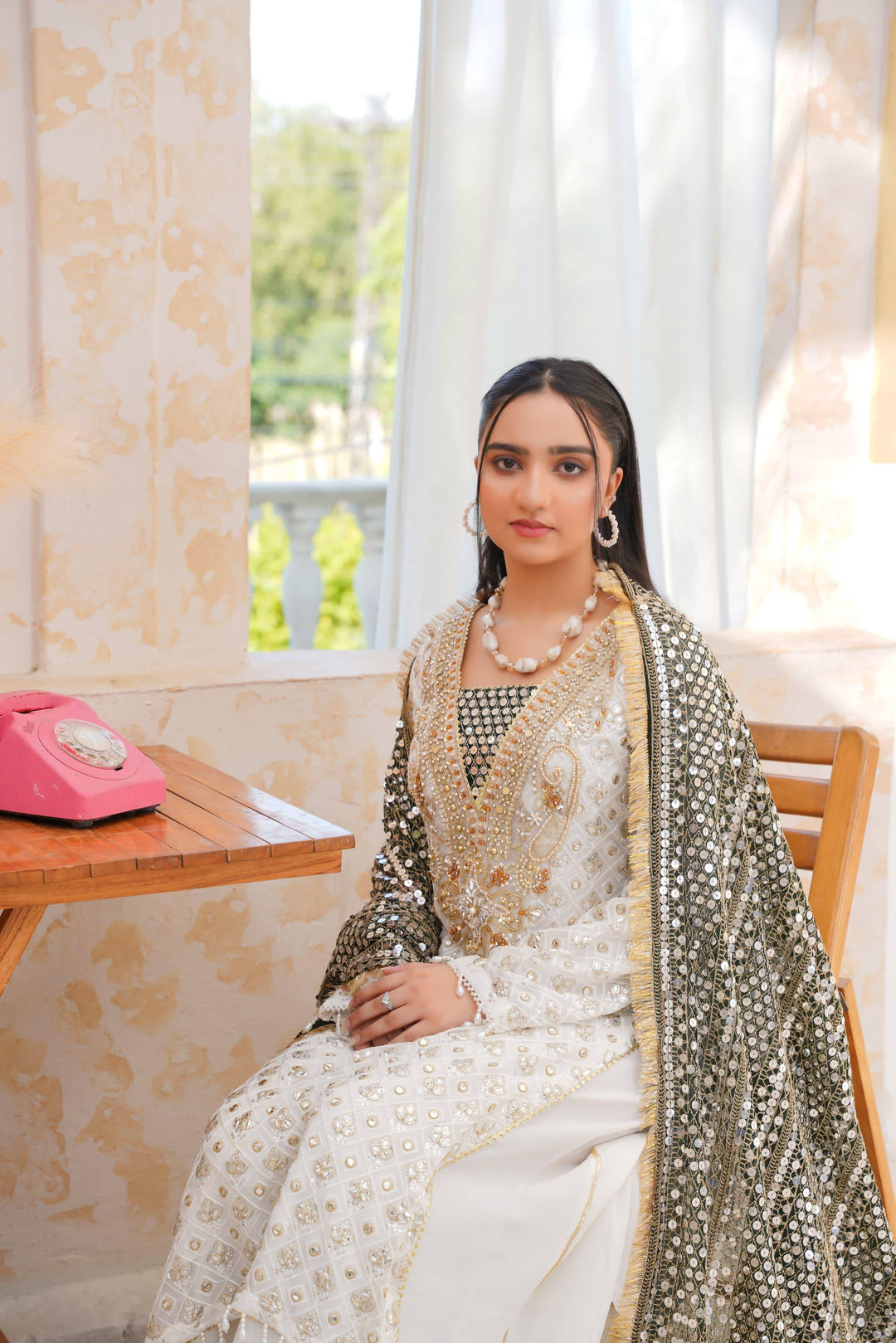 Elegant RANGREZA SAJNI festive contemporary dress with intricate embroidery and mirrorwork dupatta, perfect for Pakistani party wear.