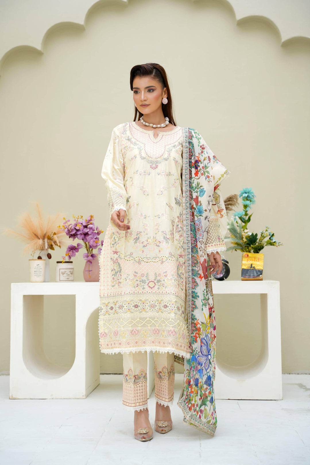 Elegant Rangreza Sajni Formal Pakistani Clothes | Skin Lawn with pink and blue embroidery, styled with floral dupatta and matching pants.