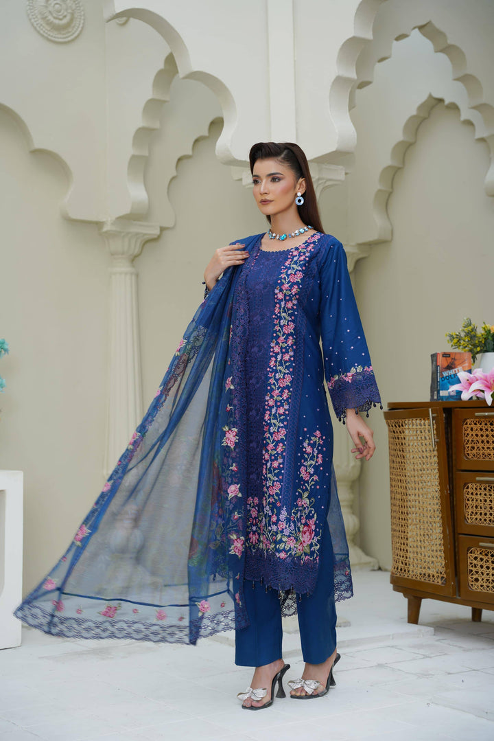 Model wearing RANGREZA SAJNI RS-3518-1000 with sheer floral dupatta and embroidered shirt, ideal for festive and traditional occasions.