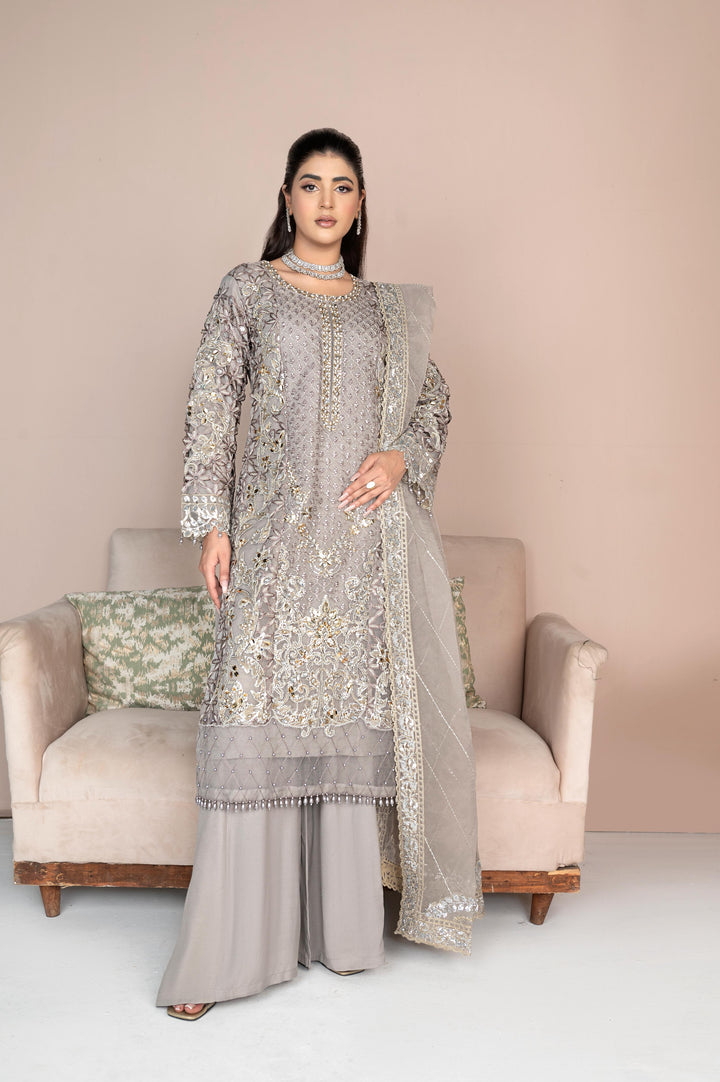 RANGREZA SAJNI RS-3528-1300 grey organza shirt with intricate embroidery, paired with grip trousers and embroidered dupatta. Pakistani designer wear.