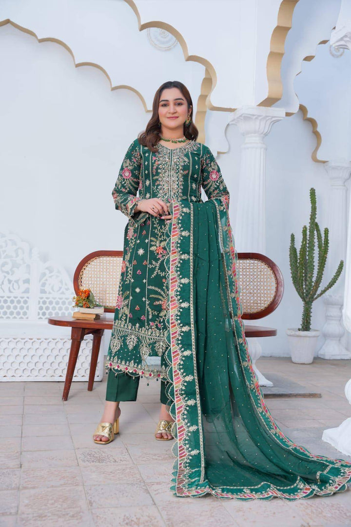 Traditional RANGREZA SAJNI party wear dress in green with floral embroidery and matching dupatta, ideal for festive events.