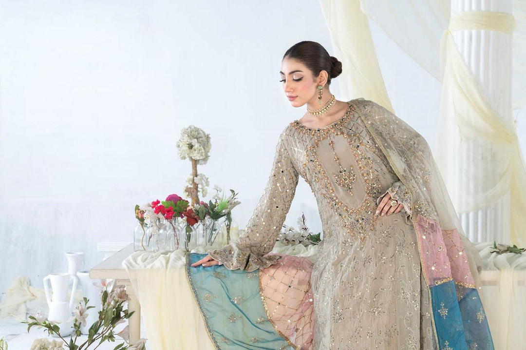 Model posing in RANGREZA SAJNI RS-3526-1500 with embellished chiffon shirt and pastel organza dupatta, ideal for women Pakistani festive wear.