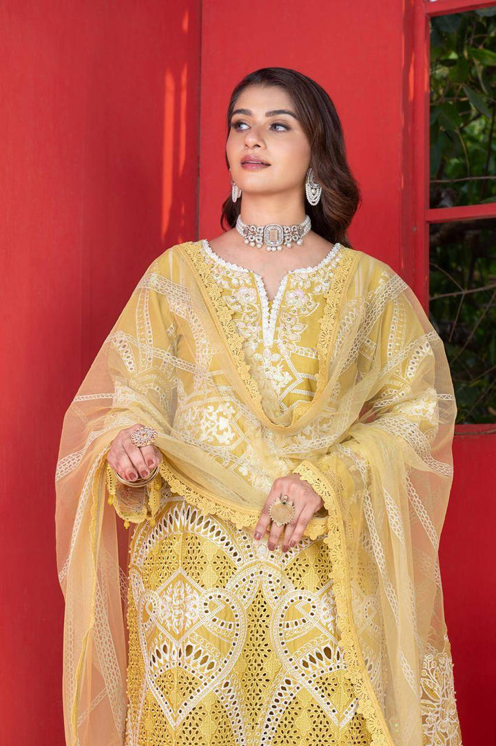 Close-up of RANGREZA SAJNI RS-3503-1200 showcasing intricate embroidery on yellow shirt and net dupatta, Pakistani formal wear.